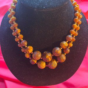 Vintage necklace, Caramel colored swirled beads